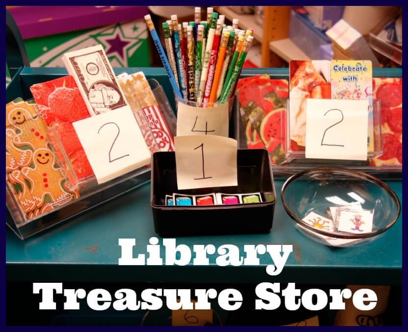 Photo of book cart with prizes for students to purchase in the Library Treasure Store.