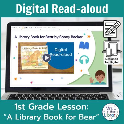 Laptop computer screen showing "A Library Book for Bear" Digital Read-aloud title slide with 2 banners reading Digital Read-aloud and 1st Grade Lesson "A Library Book for Bear"